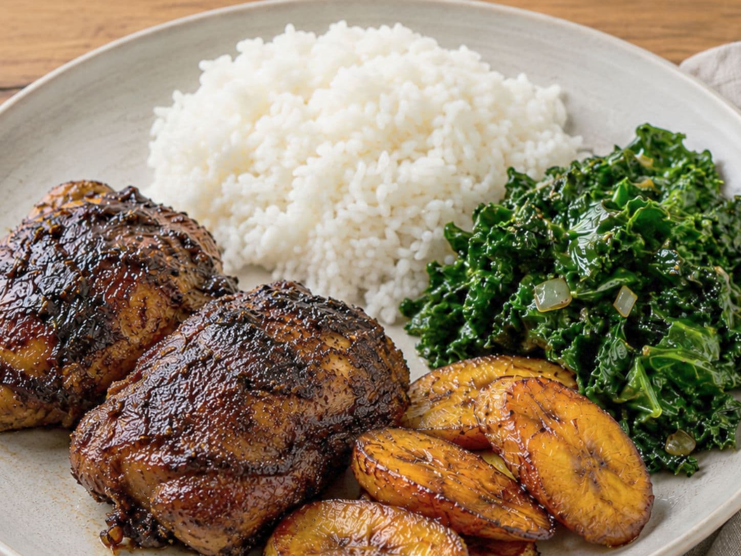 Caribbean Jerk Chicken Plate with Sweet Plantains, Coconut Rice & Sautéed Kale